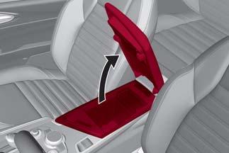 GETTING TO KNOW YOUR VEHICLE Center Console The center console storage compartment is located between the front seats.