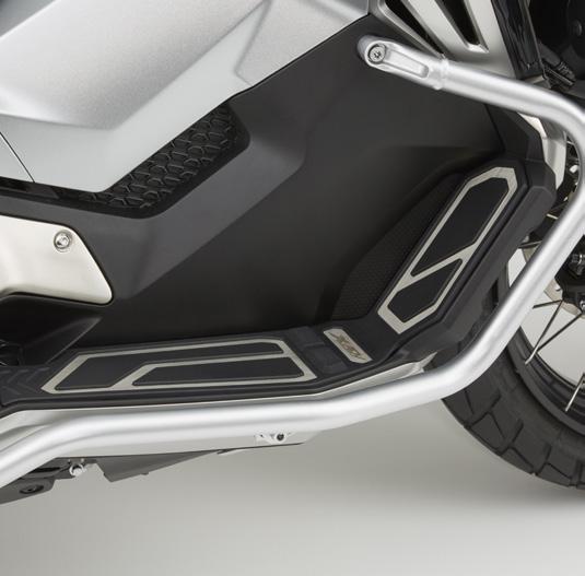 LEG DEFLECTOR 08R70-MKH-D00 A set of left and right polyurethane deflectors that fit to the fairing and extend the amount of wind protection around the legs of the rider.