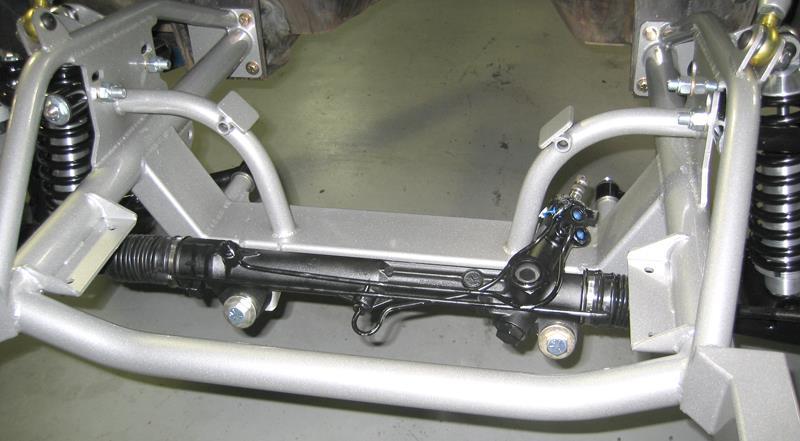 Finish tightening the ½ nylock nuts on the ends of the upper a-arm shaft until inner sleeves are seated securely. Upper ball joint = Moog Part# K772 17. Rack & Pinion Centering Procedure.