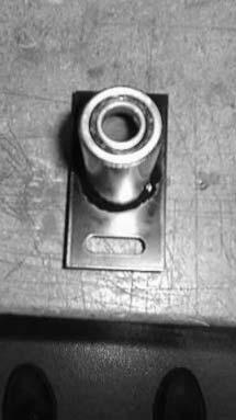 Use an arbor press to press the short steering shaft and two bearings
