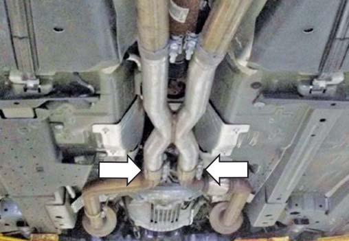 Remove the hangers from the exhaust for reuse.