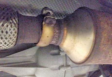 However, it may be easier to cut the system into two (2) pieces by cutting behind the muffler.
