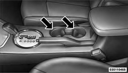 CAUTION! For vehicles equipped with the heated and cooled cupholder, locate the cup holder ash receiver in the forward cupholder. The optional ash receiver also comes with a cigar lighter.