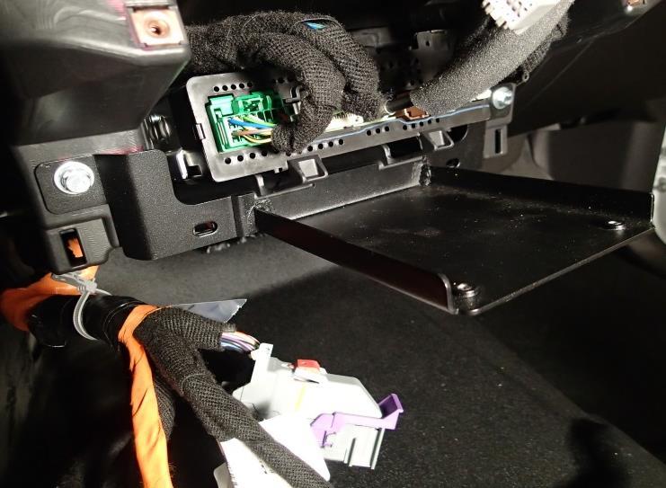 (2) lower dash panel screws.