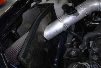 l. Position the AEM intake for best fitment. Be sure that the pipe or any other component is not in contact with any part of the vehicle.