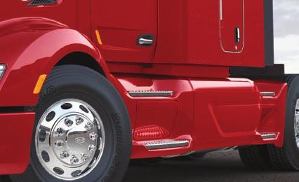 Roof fairings and trim tabs help push air up and over the cab and trailer to reduce drag and improve fuel economy.