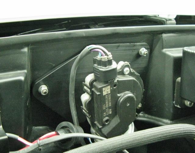 34. Install the wiper motor connector to the wiper motor (Figure 25). Figure 25 Install Wiper Motor Connector 35.