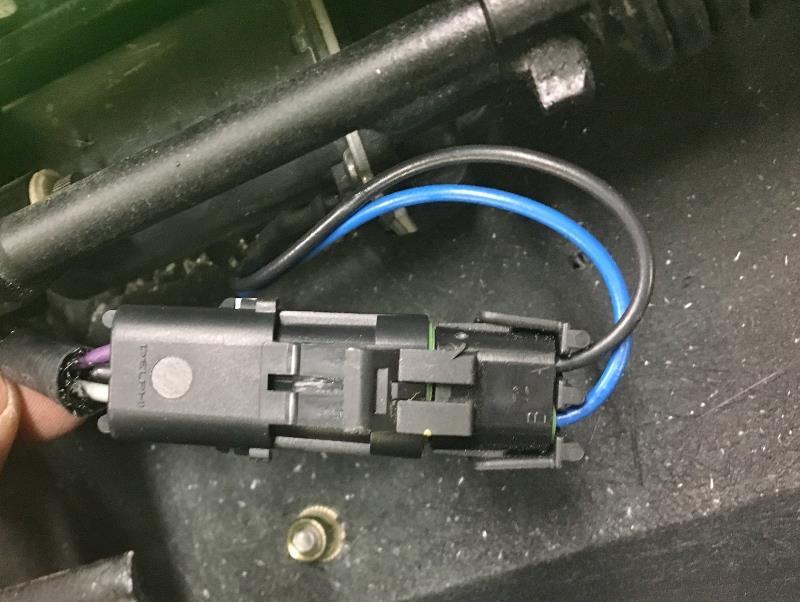 Connect the weatherpack connector between the wiper door motor and the DSE harness (Figure 36).