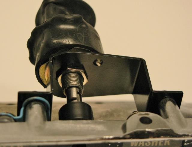 21. With the anti-rotation tab of the switch locked in place on the switch adapter, tighten the hex nut onto the wiper switch (Figure 14). Anti- Rotation Tab Figure 14 Tighten Switch Nut 22.