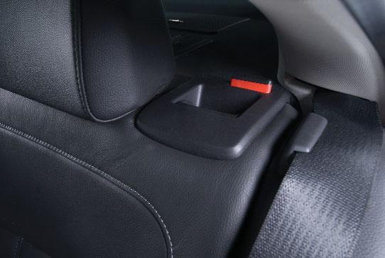 Press the release button to raise or lower the head restraint. Folding Rear Seats 1.