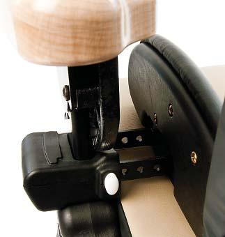 Hip guides can be used with both armrests and forearm prompts. White button Icon To attach the left hip guide: Remove the left armrest.
