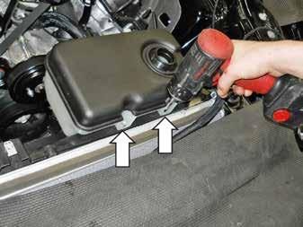 Install the Intercooler Pump Inlet Hose (1315-8D029) to the bottom of the intercooler degas bottle and secure it with the Clamp (CT19X12). 7.