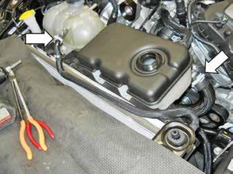 Install the 3/8" Engine Bottle Degas Hose from the engine degas bottle to the fitting by the