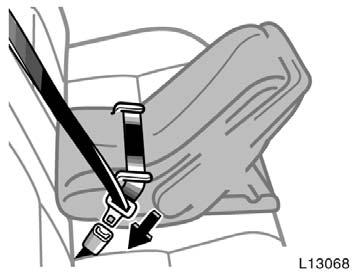 Run the lap and shoulder belt through or around the infant seat following the instructions provided by its manufacturer and insert the tab into the buckle taking care not to twist the belt.
