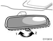 To fold the rear view mirror, push backward. CAUTION Do not drive with the mirrors folded backward.