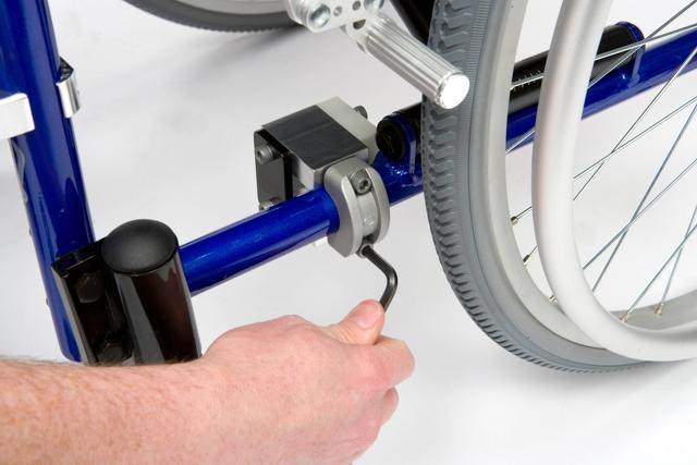 2. Bracket Installation 3. U-Drive Unit Installation Position the U-Drive unit behind the wheelchair and ensure that the motors are in the DRIVE position.