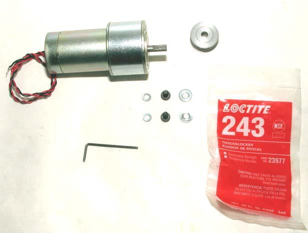 Place the pulley onto the motor shaft and align the flat on the motor shaft with the set screw that has been coated with Loctite. (Note: This is an essential step.