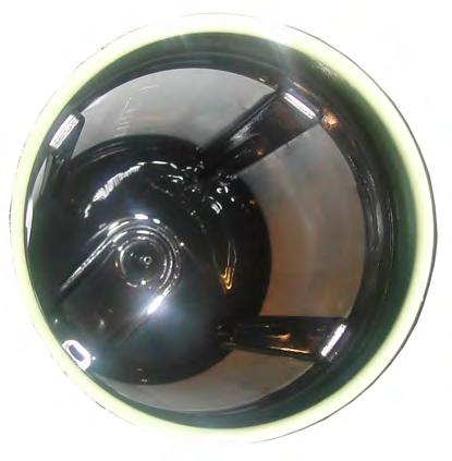 The stand pipe inside the stage 1 filter housing includes a check ball and a conical relief.