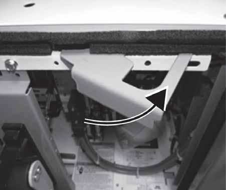3. If necessary, install unit support assembly by inserting shelf brackets at a slight angle into the appropriate holes in the vertical bus support angle and snapping into place.