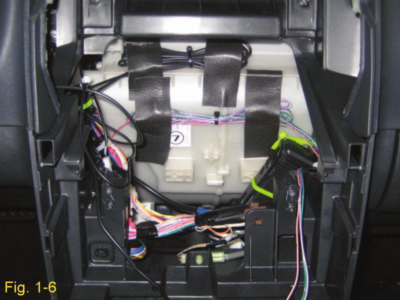 NOTE: DO NOT remove protective foam wrap from module. 1. Interlock two (2) wire ties and secure the module to the support bar to the right of the radio opening (Fig. 1-6).