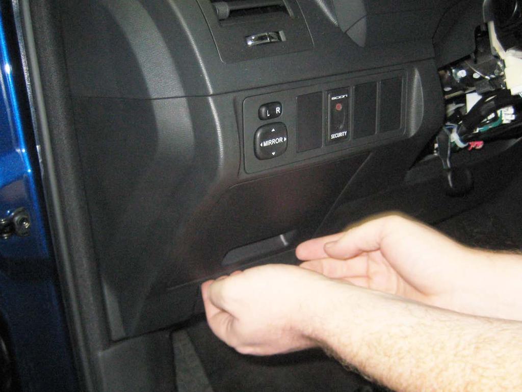Reinstall the fuse panel cover. Fig. 1-14 2. Reinstall lower portion of the steering column. 3.