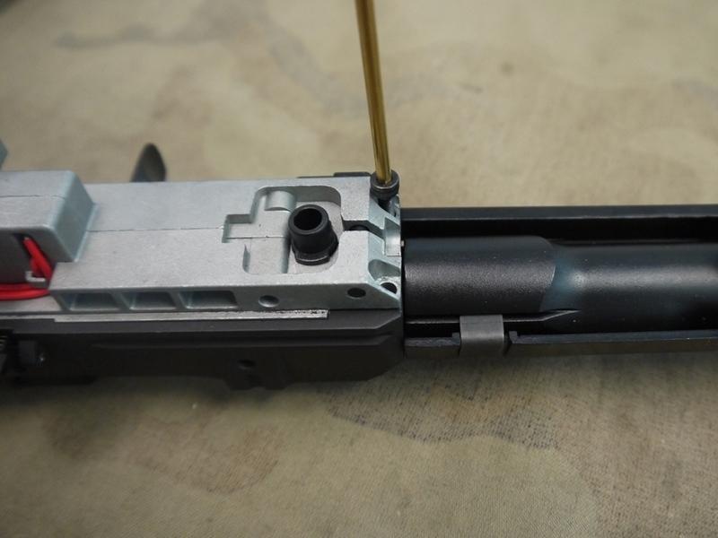 Make sure the large part of the charging handle slide into the