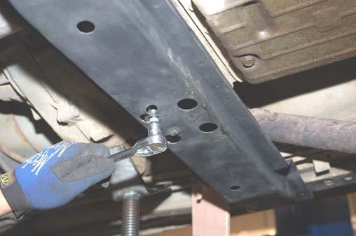 wrench. Retain axle hardware 14. Support the transmission with a transmission jack or comparable jack. 15.