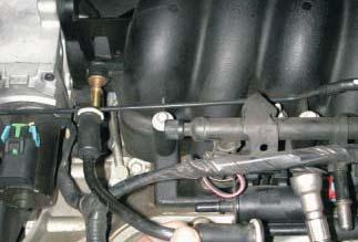 pressure and return hoses) from the fuel rail. Be careful, the system may be under pressure.