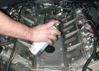 ) At this time install the new supplied intake gaskets (2) into the recesses in the intake manifold. 105.