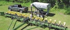 Use with virtually any planter including center fill models. Page 2 The conveyor can be transported to the front or to the rear.