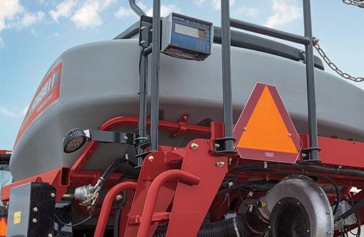 The 70-bushel tank on the 25 and 30 foot machine and 100-bushel tank on the 40 foot machine have a high, rearward mounting position to easily access the seed meter and row units below.