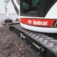 Features that make the difference Dual-Cylinder Dozer Blade with Float How s this for standard equipment?