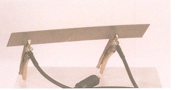 Prior to securing the clamp, make certain that the contact area is free of rust, paint, grease,