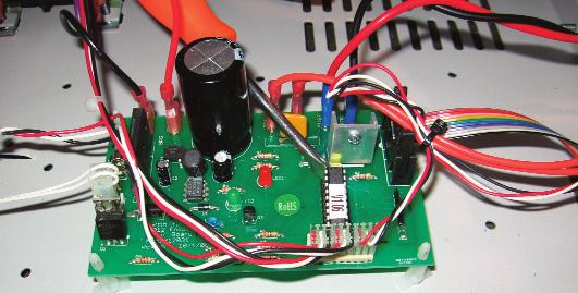 exposing the circuit board. Locate program chip on board as shown in picture below.
