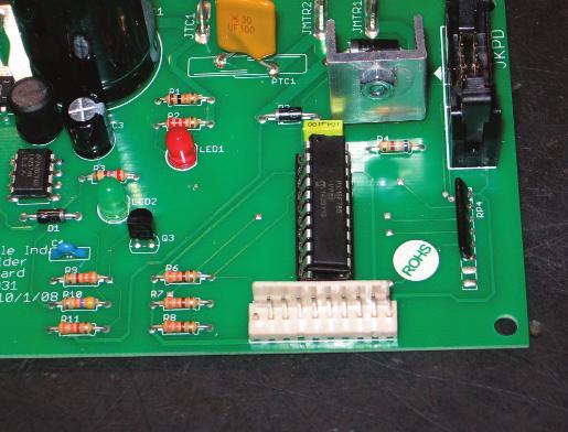 New Chip Installed in Socket--- Confirm That All Chip Pins are Straight and Installed in Socket When Installing New Chip in Board, Carefully Align Pins on Both Sides of Chip with Socket and Seat Chip