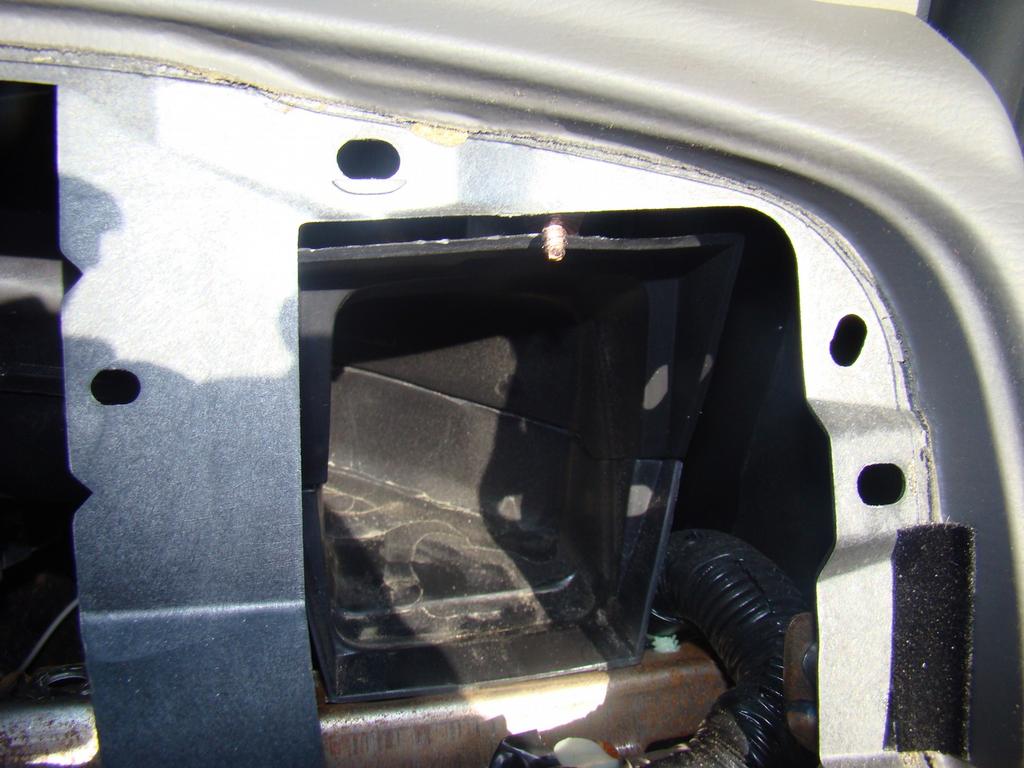 4) Two screws hold the duct in place, one on top and one below the vent.