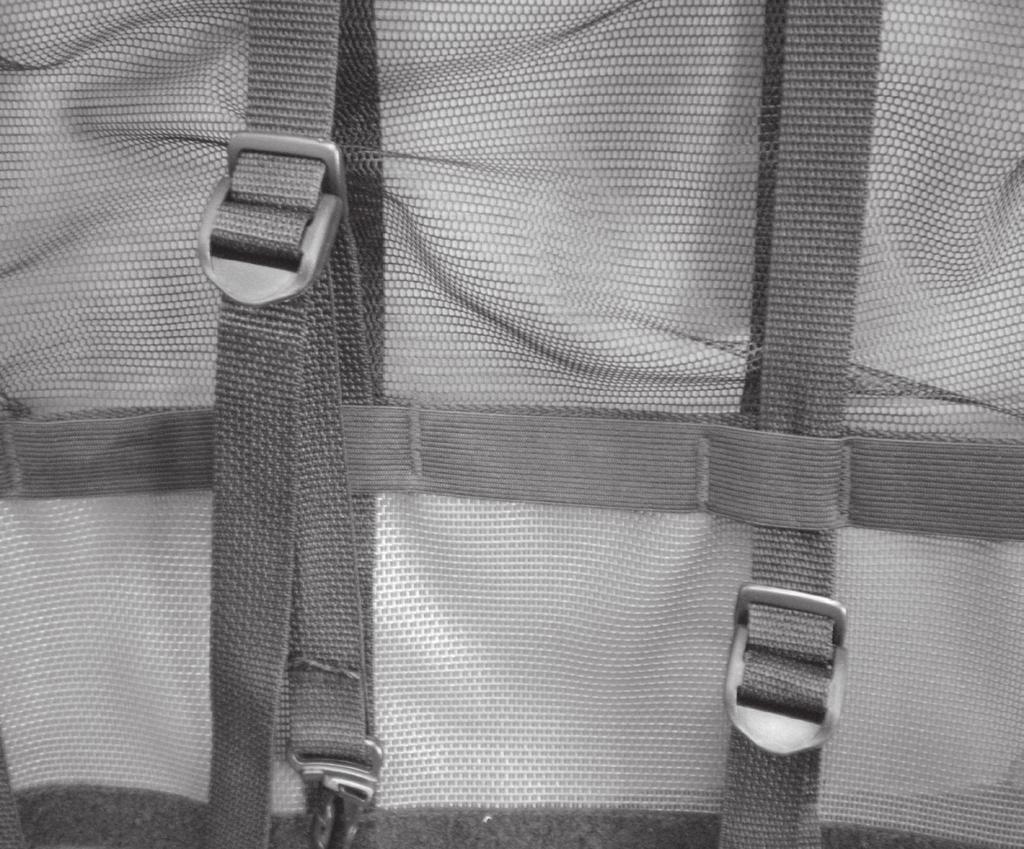 Note: For taller children, the seat harness can be adjusted by moving the buckles on the shoulder strap webbing into the helmet pocket area, above the horizontal elastic.