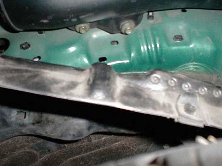 23. Remove the 2 bolts that hold the factory tube that feeds air to the air box (Figure
