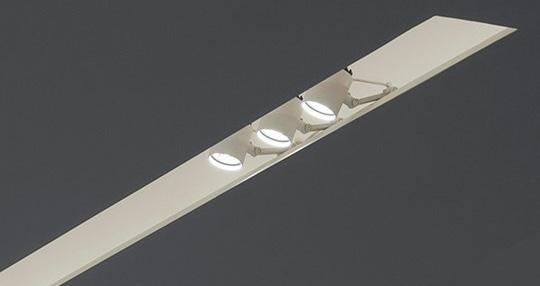 Description The Light Cut is a linear cove lighting system comprising a knife-edge extruded profile which integrates perfectly in drywall ceilings and moveable spot modules.