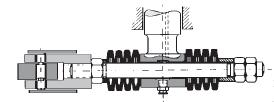 Sectional view of the starter showing the general arrangement of components. The windingspindle with ratchet is on the left.