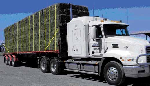 7 Small square bales: A load of small square bales requires a strap over every stack/row. The top layer of bales must be aligned longitudinally.