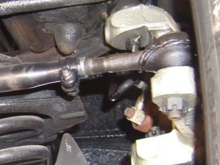 Remove the outer tie rod end cotter pins.