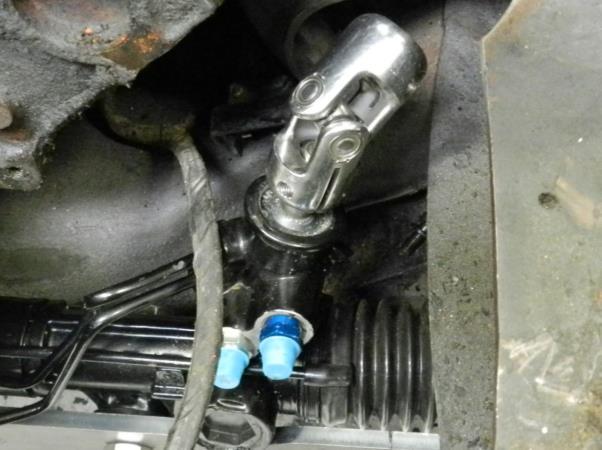 Take off old linkage up to the end of the steering column.