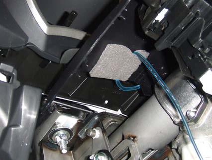 5-2 inches of adhesive foam pad, secure the microphone cable to the inside of the top steering column