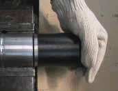 Hold Barrel (67) in a soft-jaw vice.