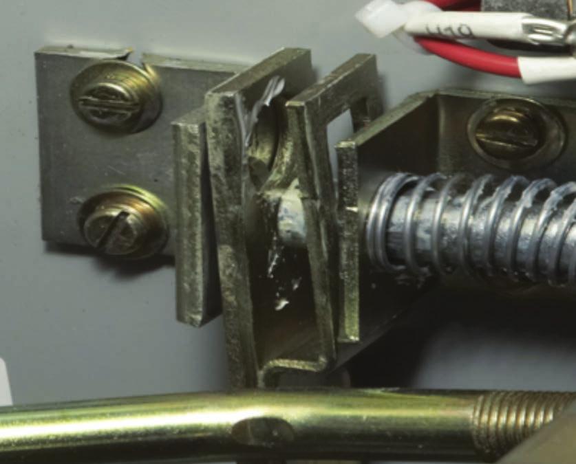 Adjustment Nuts On the Interlock Assembly Figure 10. View of unblocked Pusher Rod when the contactor is open. Figure 8.