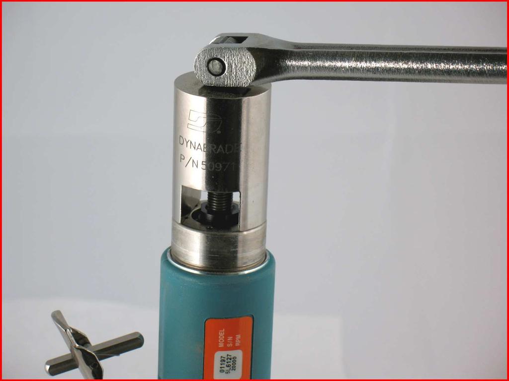 3. Use the 50971 Lock Ring Wrench to remove