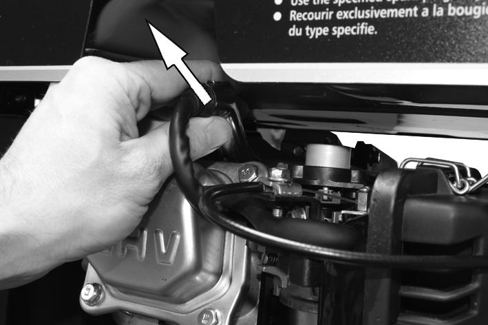 CHANGING THE SPARK PLUG CAUTION: ALLOW THE ENGINE TO COOL BEFORE REMOVING THE SPARK PLUG. 1.