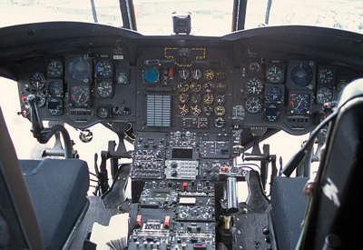 The inside of the cockpit (top right picture) is fitted in with a lot of dials and many other electronic equipment.
