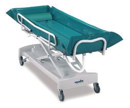 Shower/Bath Trolleys AH0060 - Aqualift Patient Shower/Bath Trolley Stable trolley platform for bathing, drying and dressing Also used as a treatment trolley, changing and transfer platform High